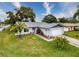 This single-story home has a large backyard and is situated on a quiet street at 8015 Pequena Dr, Port Richey, FL 34668