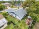 Aerial view of house, highlighting its size and location in the neighborhood at 8015 Pequena Dr, Port Richey, FL 34668