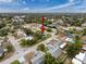 Property location shown from above, highlighting neighborhood context at 8015 Pequena Dr, Port Richey, FL 34668