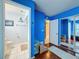 Clean bathroom with shower and built-in shelving at 8015 Pequena Dr, Port Richey, FL 34668