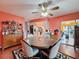 Spacious dining area with kitchen and backyard access at 8015 Pequena Dr, Port Richey, FL 34668