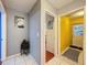 Bright hallway with access to multiple rooms and laundry at 8015 Pequena Dr, Port Richey, FL 34668