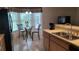 Bright kitchen with breakfast nook and modern appliances at 8213 Reynolds, Hudson, FL 34667