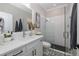 Modern bathroom with white vanity and hexagon floor tile at 11061 Egeria Dr, Odessa, FL 33556