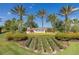 Entrance to Esplanade at Starkey Ranch community with lush landscaping at 11061 Egeria Dr, Odessa, FL 33556