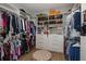 Large walk-in closet with ample shelving and hanging space at 11061 Egeria Dr, Odessa, FL 33556