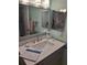 Bathroom with vanity, sink, and mirror at 11203 Pembridge Ct # 1, Port Richey, FL 34668