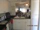 Functional kitchen with ample counter and cabinet space at 11203 Pembridge Ct # 1, Port Richey, FL 34668