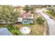 Property overview showing house, pool, and backyard landscaping at 12529 Shadow Ridge Blvd, Hudson, FL 34669