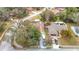Aerial view of house, yard, and neighborhood at 12529 Shadow Ridge Blvd, Hudson, FL 34669