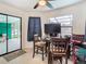 Casual dining area with table and chairs, and access to backyard at 12529 Shadow Ridge Blvd, Hudson, FL 34669