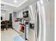Modern kitchen with stainless steel appliances and light gray cabinets at 12529 Shadow Ridge Blvd, Hudson, FL 34669