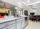 Modern kitchen with gray cabinets and stainless steel appliances at 12529 Shadow Ridge Blvd, Hudson, FL 34669