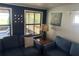 Relaxing living room with two sofas and nautical decor at 12529 Shadow Ridge Blvd, Hudson, FL 34669