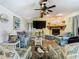 Spacious living room with stone fireplace and comfortable seating at 12529 Shadow Ridge Blvd, Hudson, FL 34669