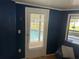 Living room with pool access and comfortable seating at 12529 Shadow Ridge Blvd, Hudson, FL 34669