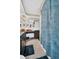 Bathroom features a shower and a vanity with countertop at 1333 Normandy Blvd, Holiday, FL 34691