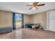 Cozy bedroom with wood-look floors and window at 1333 Normandy Blvd, Holiday, FL 34691