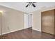 Bedroom with wood flooring and access to bathroom at 1333 Normandy Blvd, Holiday, FL 34691