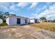 Front view of a house with a large yard at 1333 Normandy Blvd, Holiday, FL 34691