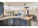 Kitchen with dark wood cabinets and corner island at 1333 Normandy Blvd, Holiday, FL 34691