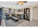 Living room with sectional sofa and backyard access at 1333 Normandy Blvd, Holiday, FL 34691