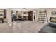 Living room with sectional sofa and large TV at 1333 Normandy Blvd, Holiday, FL 34691