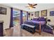 Main bedroom with king bed, sliding doors to the pool at 1333 Normandy Blvd, Holiday, FL 34691