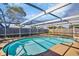 Enjoy this relaxing kidney-shaped pool area at 1333 Normandy Blvd, Holiday, FL 34691