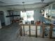 Kitchen under renovation with new countertops and a view of the backyard at 13618 Stacey Dr, Hudson, FL 34667