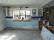 A kitchen undergoing renovation with new flooring at 13618 Stacey Dr, Hudson, FL 34667
