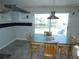 Kitchen with direct access to the backyard and water views; ready to be upgraded for modern living at 13618 Stacey Dr, Hudson, FL 34667