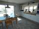 Kitchen with a stainless steel table, a window with water views, and open potential for upgrades at 13618 Stacey Dr, Hudson, FL 34667
