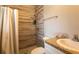 Bathroom with shower, toilet, and vanity at 18025 Nimick Rd, Weeki Wachee, FL 34614