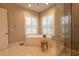 Relaxing bathroom with a large soaking tub and walk-in shower at 18025 Nimick Rd, Weeki Wachee, FL 34614