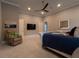 Spacious bedroom with a large bed and a comfortable armchair at 18025 Nimick Rd, Weeki Wachee, FL 34614