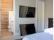 Bedroom with two TVs and ensuite bathroom at 18025 Nimick Rd, Weeki Wachee, FL 34614
