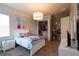 Charming bedroom with a white bed frame and plenty of closet space at 18025 Nimick Rd, Weeki Wachee, FL 34614