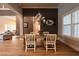 Bright dining room with wooden table and chandelier at 18025 Nimick Rd, Weeki Wachee, FL 34614