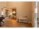 Two-story entryway with hardwood floors and a view to the dining area at 18025 Nimick Rd, Weeki Wachee, FL 34614