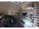 Spacious garage with high ceilings and overhead storage at 18025 Nimick Rd, Weeki Wachee, FL 34614