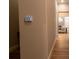 Bright hallway with security panel and view into dining area at 18025 Nimick Rd, Weeki Wachee, FL 34614