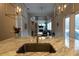 Modern kitchen with a large island and stainless steel sink at 18025 Nimick Rd, Weeki Wachee, FL 34614
