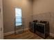 Laundry room with washer, dryer, and shelving at 18025 Nimick Rd, Weeki Wachee, FL 34614