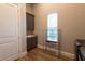 Laundry room with sink, cabinets, and shelving at 18025 Nimick Rd, Weeki Wachee, FL 34614