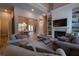 Spacious living room with open floor plan and fireplace at 18025 Nimick Rd, Weeki Wachee, FL 34614
