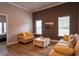 Bright living room featuring hardwood floors and comfortable seating at 18025 Nimick Rd, Weeki Wachee, FL 34614