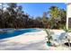 Inviting pool area with a spa and plenty of lounge space at 18025 Nimick Rd, Weeki Wachee, FL 34614