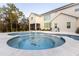 Large freeform pool and spa with plenty of patio space at 18025 Nimick Rd, Weeki Wachee, FL 34614