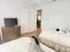 Bedroom with twin beds and dresser at 18049 Tarrington Pl, Hudson, FL 34667